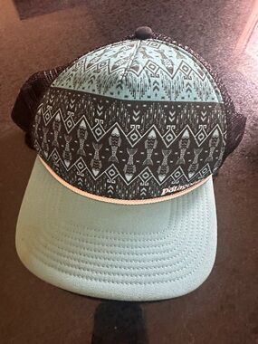 Patagonia Black Mesh Trucker Hat with Teal Logo Tab